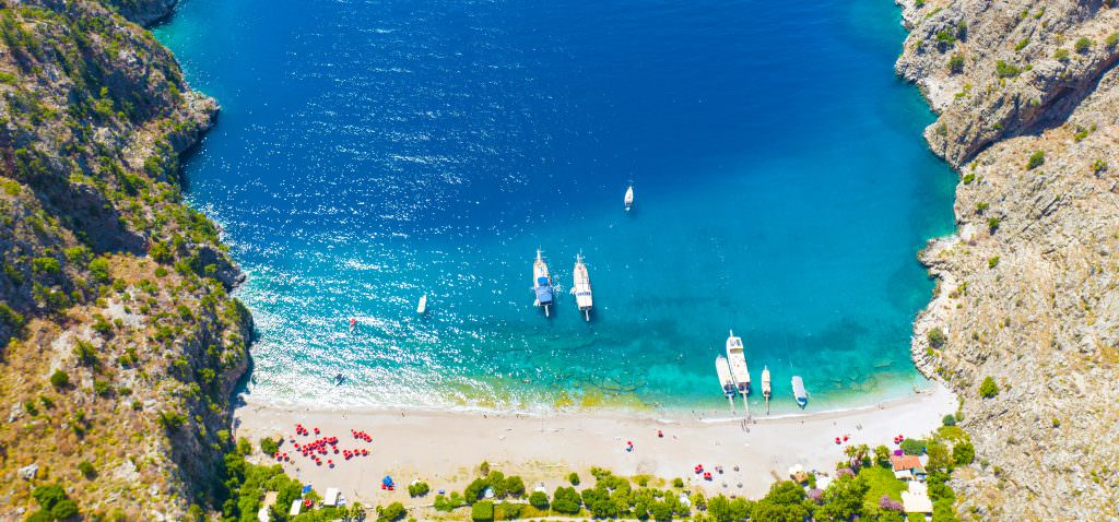 Butterfly Valley yacht charter turquoise beach Fethiye Turkey