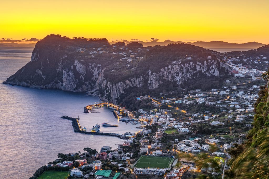 Capri yacht charter Italy luxury island Blue Grotto Mediterranean elite lifestyle Amalfi Coast