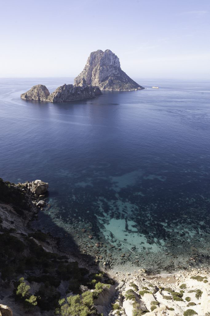 Ibiza yacht charter luxury beach club Mediterranean Spain turquoise water coastal view
