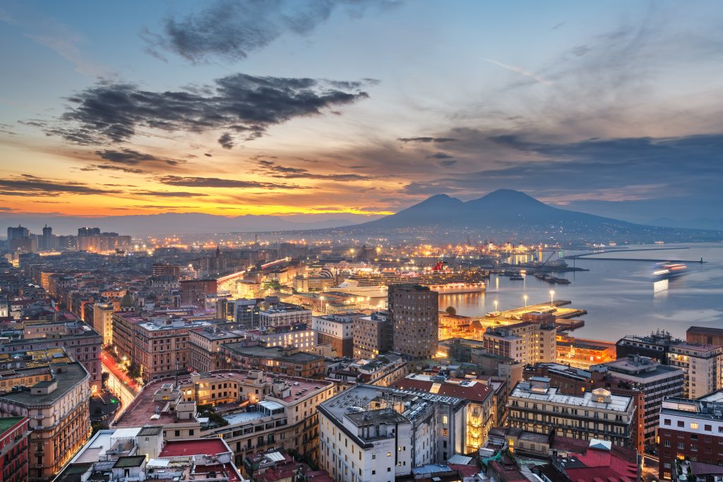Naples yacht charter city skyline with Mount Vesuvius Gulf of Naples Mediterranean yacht charter destination Italy