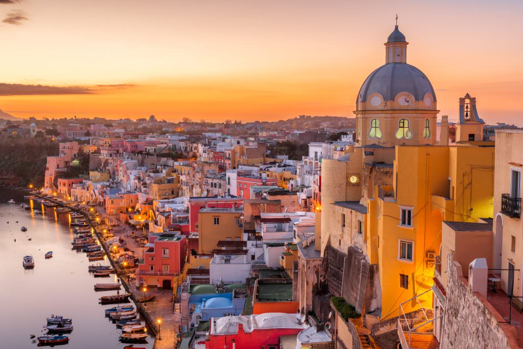 Marina Corricella Procida island sunset Gulf of Naples Mediterranean luxury yacht charter Italy