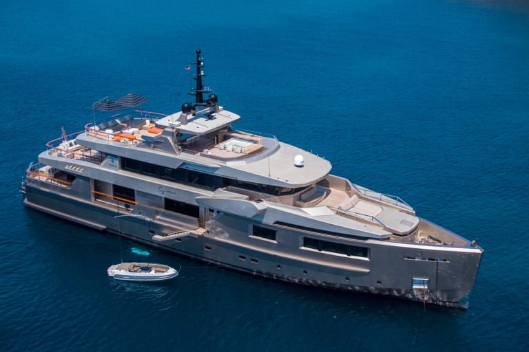Maverick yacht charter exterior aerial view cruising in deep blue sea Luxury yacht
