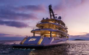 Kaira Yachts – JOY superyacht sunset exterior luxury yacht charter experience
